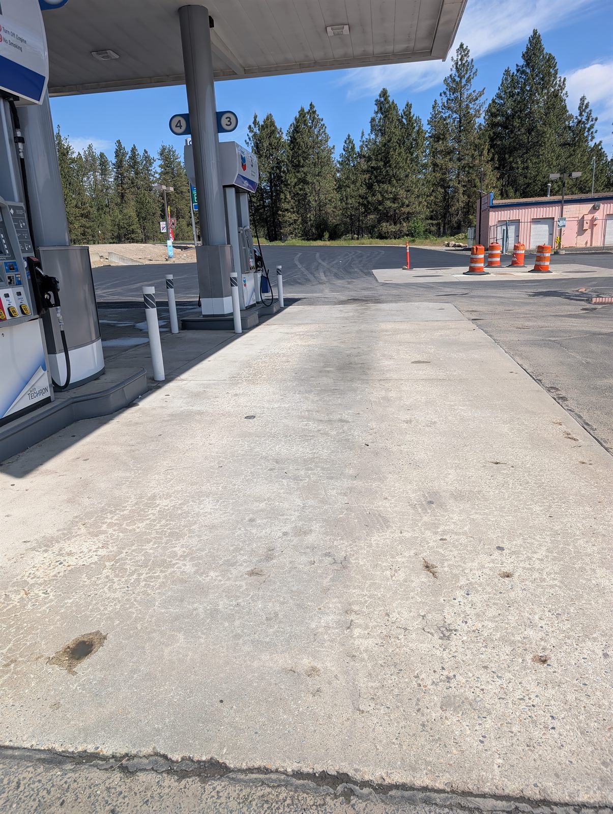 After eco friendly pressure washing Spokane - clean concrete gas pad